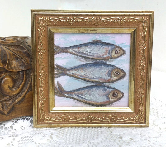 “Sardines” by Alena Santgor, oil on board (framed)